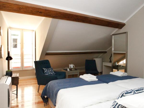 Flores Guest House : photo 2 de la chambre grande chambre double ou lits jumeaux