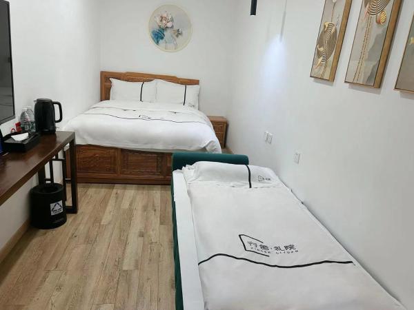 Xingshe Alley Courtyard Hotel Beijing Wangfujing Forbidden City Branch : photo 4 de la chambre li yuan two bedroom suite