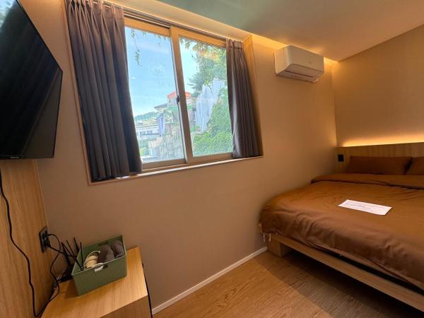 Well Plus Guest House : photo 2 de la chambre chambre double deluxe