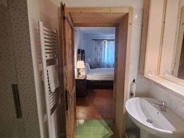 La Vineria di San Mattia : photo 4 de la chambre chambre double ou lits jumeaux standard - vue sur jardin