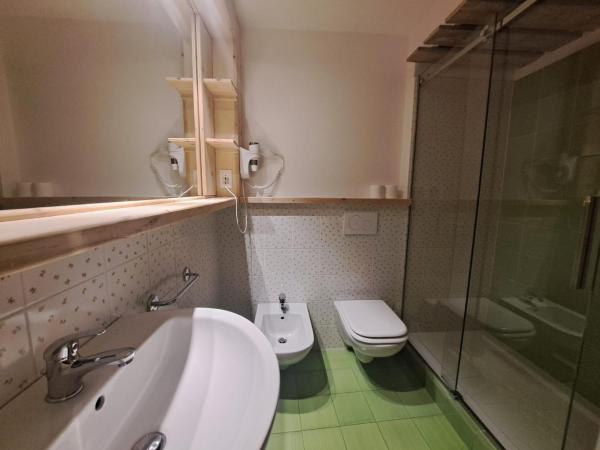 La Vineria di San Mattia : photo 5 de la chambre chambre double ou lits jumeaux standard - vue sur jardin