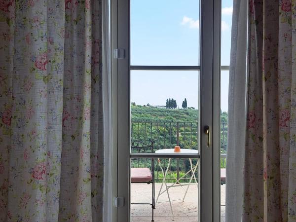 La Vineria di San Mattia : photo 9 de la chambre chambre double ou lits jumeaux deluxe – vue sur jardin