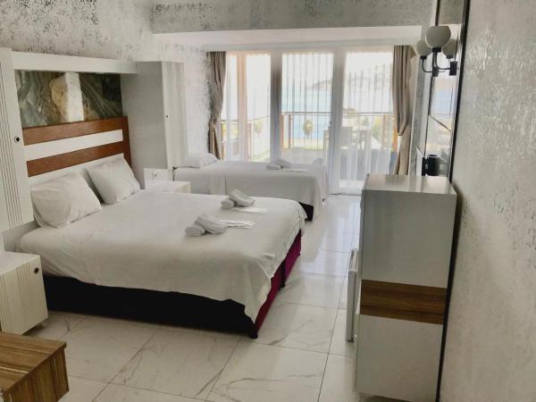 Bodrum Liman Resort : photo 3 de la chambre chambre triple - vue sur mer