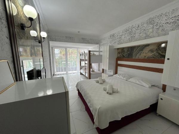Bodrum Liman Resort : photo 5 de la chambre chambre quadruple supérieure