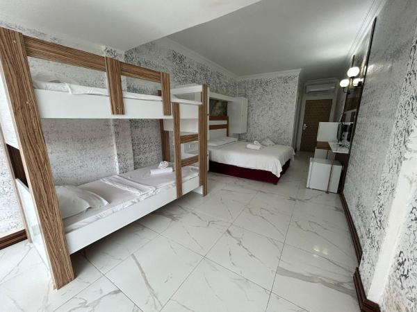 Bodrum Liman Resort : photo 4 de la chambre chambre quadruple supérieure