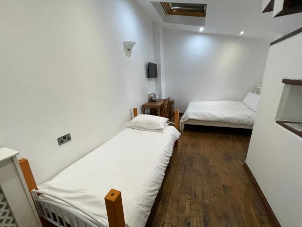 Bridge Farm Guesthouse rooms : photo 9 de la chambre chambre familiale - vue sur jardin