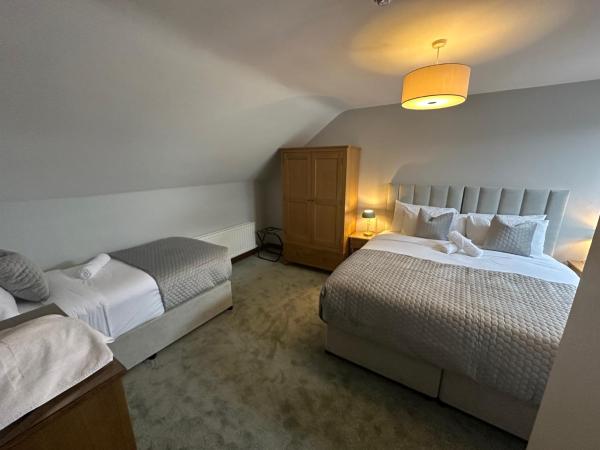 The Brook Lodge : photo 1 de la chambre chambre triple deluxe