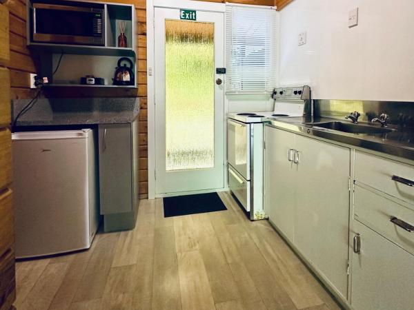 Lakes Lodge Okataina : photo 1 de la chambre studio avec vue sur jardin