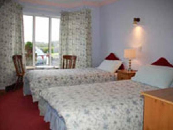 Seashore Lodge Guesthouse : photo 5 de la chambre chambre triple