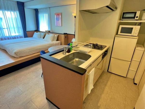 One's Residence Sapporo : photo 9 de la chambre chambre lits jumeaux avec salle de bains