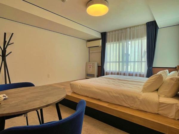 One's Residence Sapporo : photo 3 de la chambre chambre lits jumeaux avec salle de bains