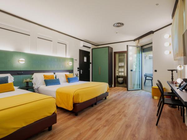JOIVY Together Florence Urban Resort : photo 1 de la chambre chambre quadruple deluxe