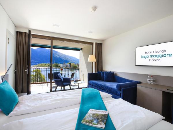 Hotel Lago Maggiore - Welcome! : photo 2 de la chambre chambre triple - vue sur lac