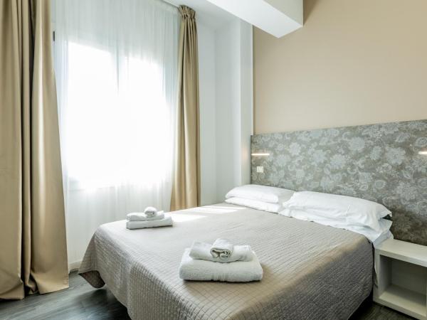 Hotel Kim : photo 9 de la chambre chambre quadruple