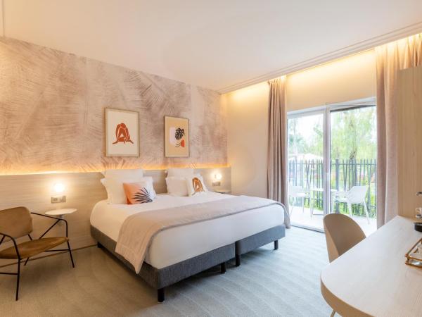Ilot du Golf BW Premier Collection : photo 4 de la chambre chambre lit king-size prestige - rez-de-jardin