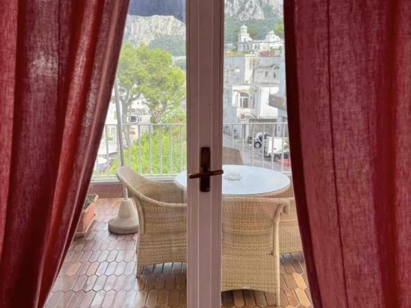 Multiproprietà Hotel Palatium Mari, con Terrazza vista mare e piscina : photo 8 de la chambre chambre quadruple - vue sur mer