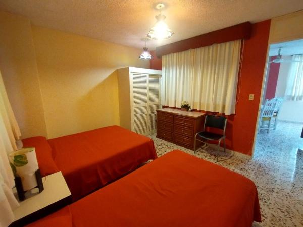 Suites Angelopolis : photo 4 de la chambre chambre familiale supérieure