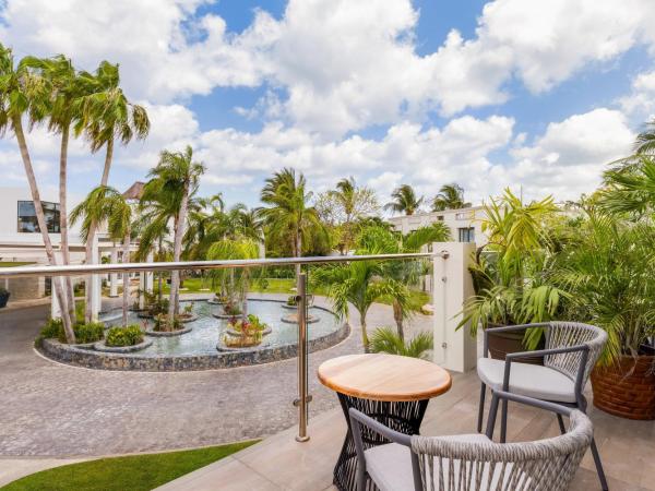Dreams Cozumel Cape Resort & Spa : photo 6 de la chambre suite junior preferred club avec lits doubles - vue tropicale