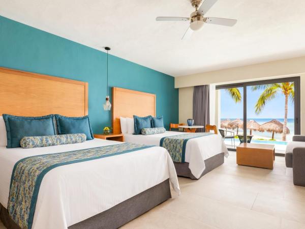 Dreams Cozumel Cape Resort & Spa : photo 2 de la chambre suite junior preferred club avec lits doubles et accès direct à la piscine - côté plage