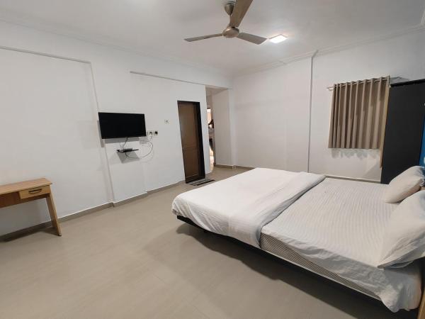 Hotel Sai Inn Executive : photo 2 de la chambre chambre deluxe