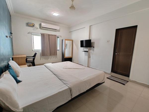 Hotel Sai Inn Executive : photo 4 de la chambre chambre deluxe