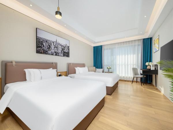 Raffles Executive Apartment - Guangzhou Huijin International Finance Center, Keyun Road Metro Station Branch-Canton Fair Free Shuttle : photo 5 de la chambre chambre lits jumeaux deluxe