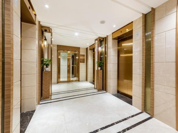 Raffles Executive Apartment - Guangzhou Huijin International Finance Center, Keyun Road Metro Station Branch-Canton Fair Free Shuttle : photo 9 de la chambre chambre lits jumeaux deluxe