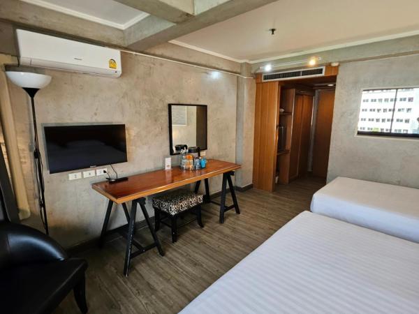 White Palace Bangkok : photo 4 de la chambre chambre triple supérieure