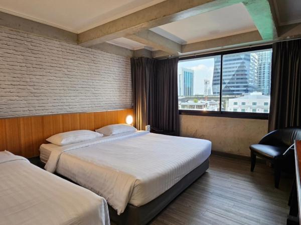 White Palace Bangkok : photo 2 de la chambre chambre triple supérieure