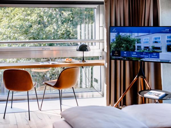 THE FLAG West M. : photo 4 de la chambre studio lits jumeaux affaires