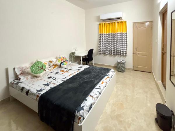 Sloane Service Apartments : photo 6 de la chambre appartement 2 chambres avec balcon