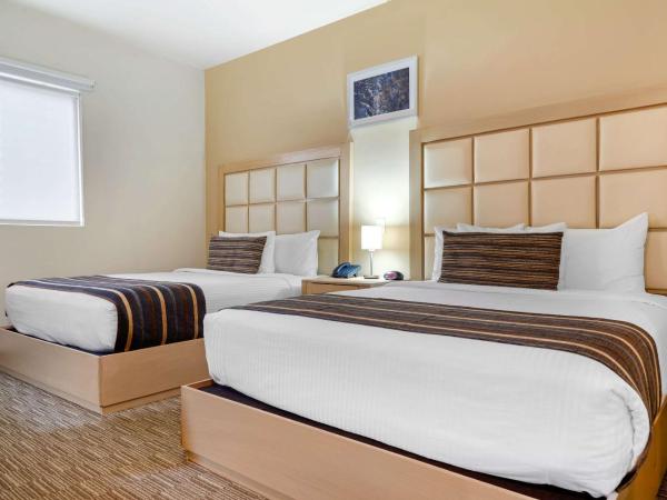 Sleep Inn Monterrey San Pedro : photo 2 de la chambre chambre avec 2 grands lits queen-size