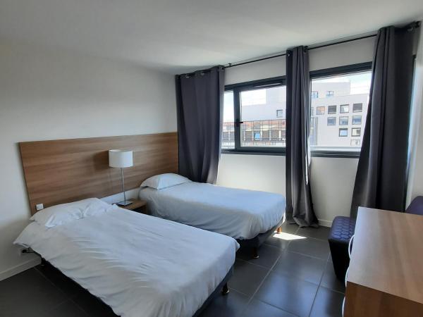 Appart'hôtel Hevea : photo 1 de la chambre appartement avec terrasse