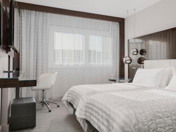 Le Méridien Etoile : photo 2 de la chambre chambre lits jumeaux familiale