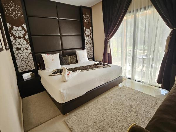 Eden Lodges & SPA : photo 6 de la chambre chambre double - vue sur jardin