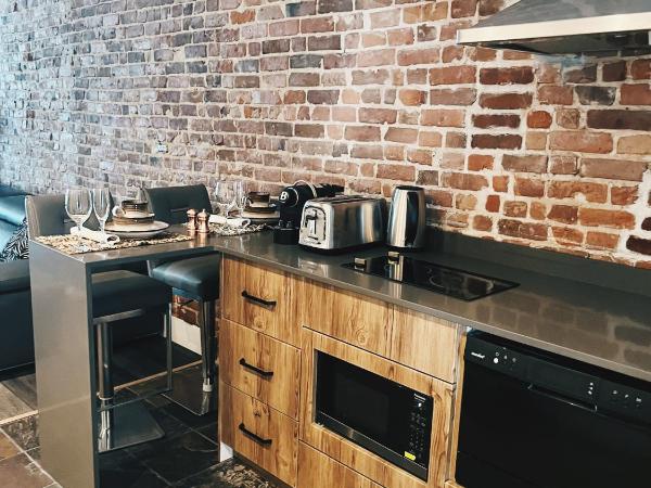 Hotel Kutuma : photo 6 de la chambre chambre lit king-size avec baignoire spa