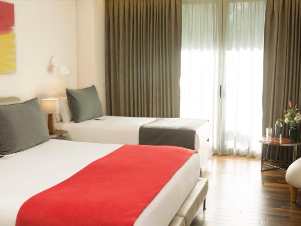 Palo Santo Hotel : photo 2 de la chambre chambre triple avec balcon