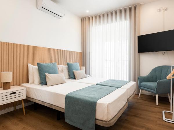 Madalena Hostel e Suites : photo 3 de la chambre chambre double avec salle de bains privative