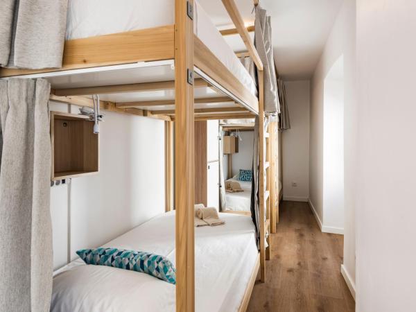 Madalena Hostel e Suites : photo 2 de la chambre lit dans dortoir pour femmes de 6 lits