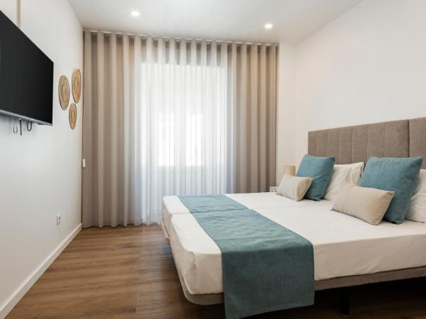 Madalena Hostel e Suites : photo 3 de la chambre chambre double avec salle de bains privative