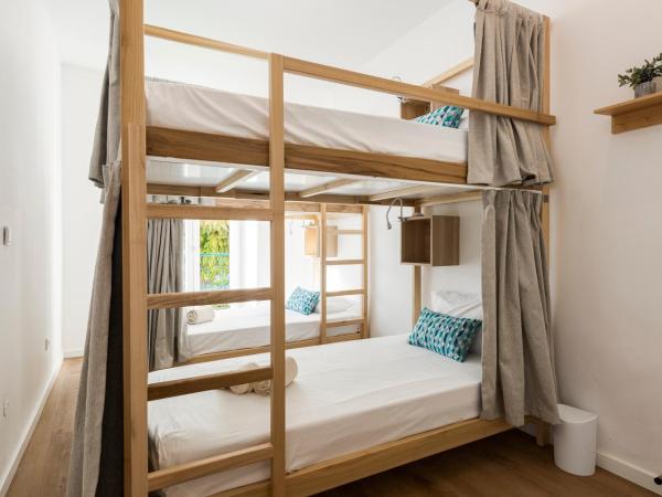 Madalena Hostel e Suites : photo 1 de la chambre lit dans dortoir mixte de 4 lits