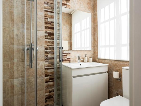 Madalena Hostel e Suites : photo 6 de la chambre chambre simple avec salle de bains privative