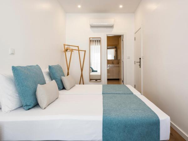 Madalena Hostel e Suites : photo 3 de la chambre chambre double avec salle de bains privative