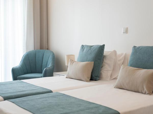 Madalena Hostel e Suites : photo 2 de la chambre chambre double avec salle de bains privative