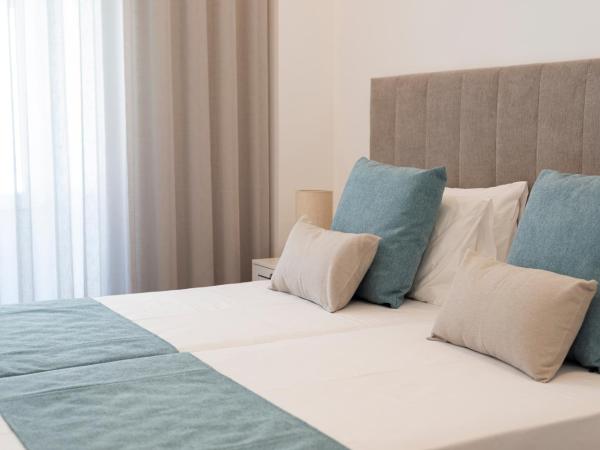 Madalena Hostel e Suites : photo 6 de la chambre chambre double avec salle de bains privative