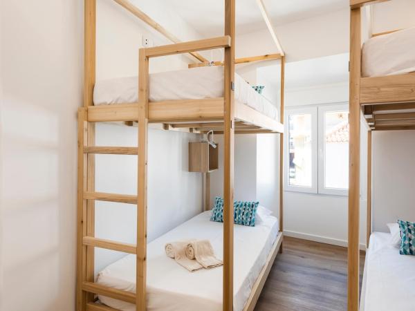 Madalena Hostel e Suites : photo 7 de la chambre lit dans dortoir pour femmes de 4 lits