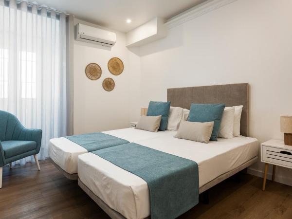 Madalena Hostel e Suites : photo 2 de la chambre chambre double