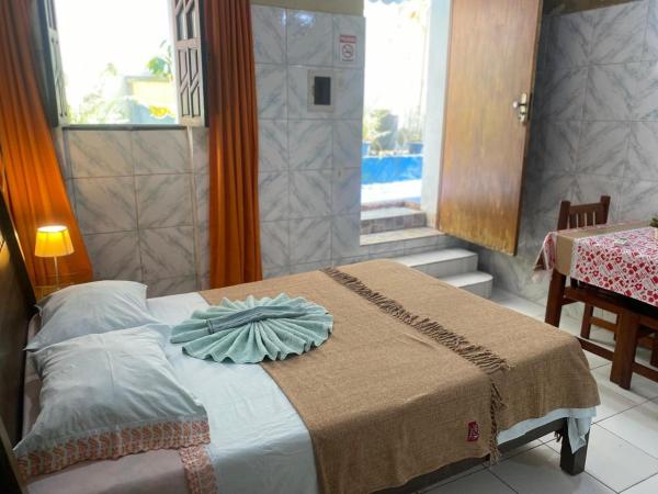 A Casa dos Mestres : photo 1 de la chambre chambre familiale avec salle de bains privative