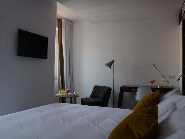 Augusta Boutique House : photo 3 de la chambre chambre double deluxe avec vue sur château