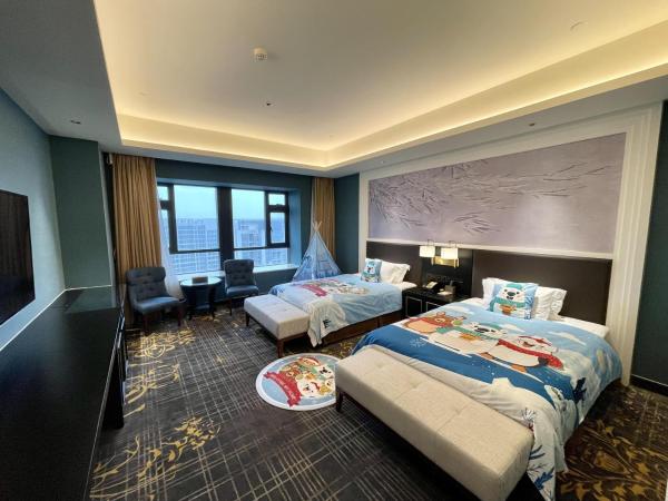 Guangzhou Pan Yu President Hotel : photo 1 de la chambre chambre lits jumeaux spacieuse